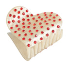 Heart-shaped hair claw clip with red crystal embellishments on a white background