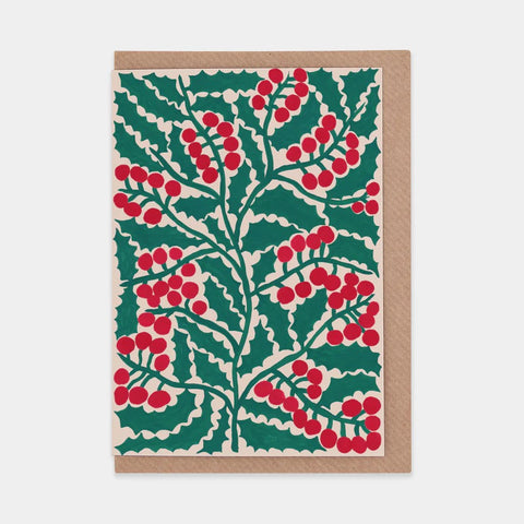 Red and green holly greetings card with a brown envelope.