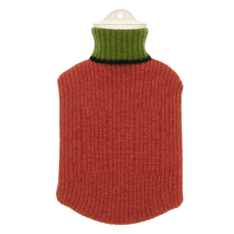 A red knitted hot water bottle cover with a stripe of black and green at the top. 