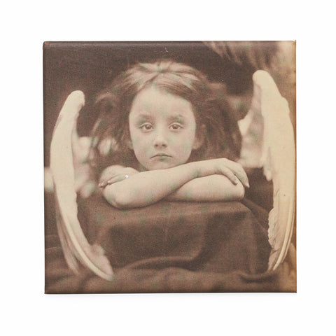 Square magnet featuring a sepia tone photograph of a young girl wearing angel wings. 