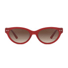 Red sunglasses with brown gradient lenses on a white background