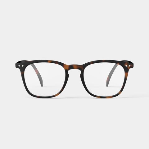 A pair of reading glasses with a dark brown tortoiseshell frame.