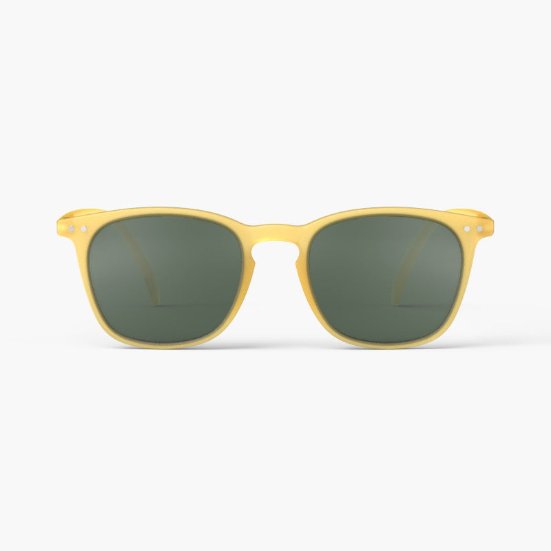 A pair of sunglasses in a bright yellow frame.