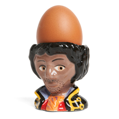 Jimi Hendrix ceramic egg cup holding a boiled egg.
