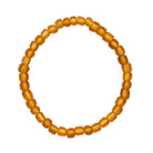 Round amber bead bracelet on a white background