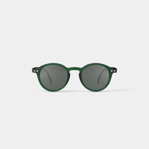 A pair of round kid's sunglasses with a green frame.