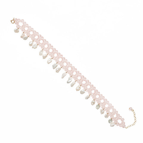 Light pink glass beaded choker with multiple large pearls hanging below with a gold chain closure at the end.
