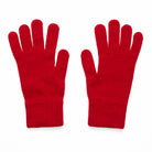 Pair of knitted red gloves on a white background
