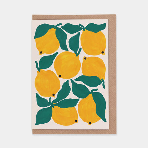 Seven yellow lemons with green leaves on a white background.