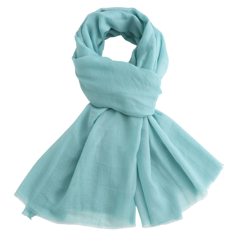Light blue scarf on a white background