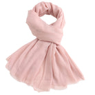 Pink scarf against a white background