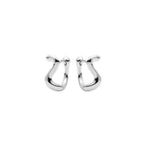 Small silver huggie earrings shaped a bit like a horseshoe. 