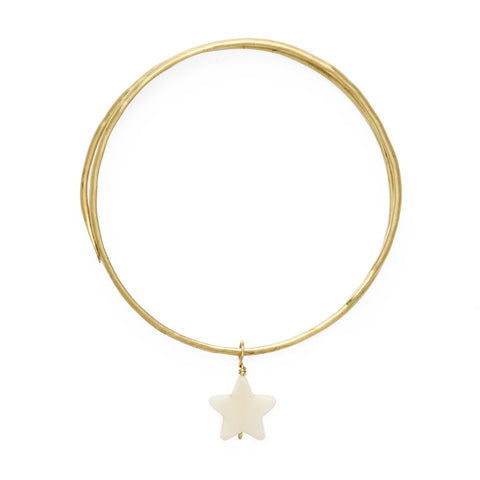 Round gold coloured bangle with white hanging star pendant.