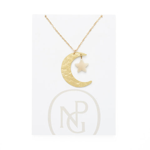 A large brass crescent moon pendant with small white star hang from a gold chain against a card backing with National Portrait Gallery logo.