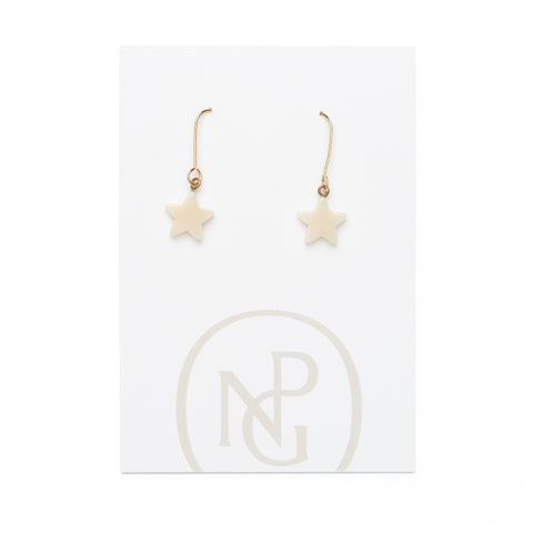 A pair of gold hook earrings with hanging white star pendants against a card backing with National Portrait Gallery logo.