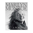 Book cover with a black and white photograph of Marilyn Monroe smiling and the title 'Marilyn Monroe A Portrait'. 