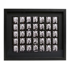 Black and white contact sheet photographic print in a black frame.
