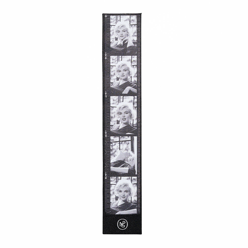 Vertical ruler with black and white images of a famous actress on a white background
