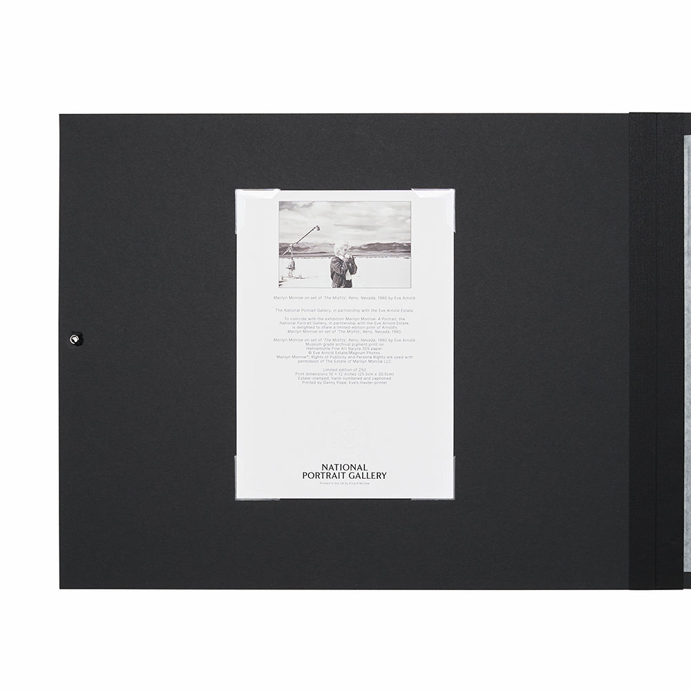 Open black folio with close up of a certificate of authenticity.