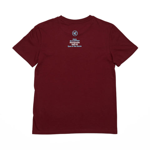 Reverse of the burgundy T-shirt featuring the exhibition title 'Paul McCartney Photographs 1963-64' and the National Portrait Gallery logo.