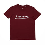 A burgundy red T-shirt featuring the word 'London' in McCartney's handwriting in contrasting white.