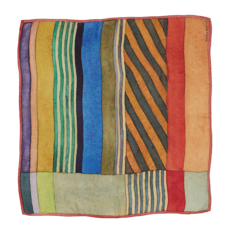 A square silk scarf with an orange brush stroke pattern.