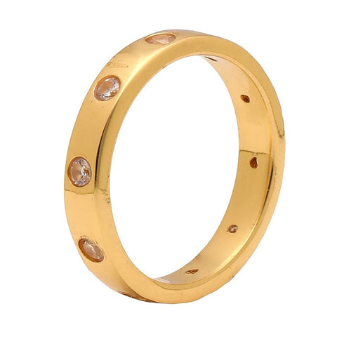 Solid gold plated ring with quartz crystal running through the band.
