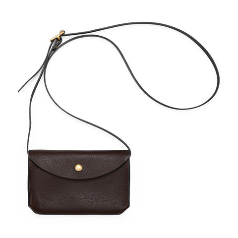 Small rectangular dark brown leather purse with folded top and gold popper with a long adjustable dark brown strap.