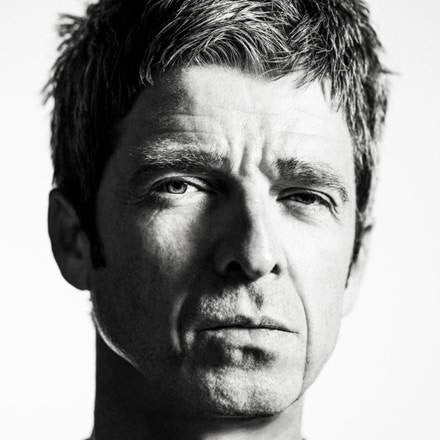 A black and white close up image of Noel Gallagher.