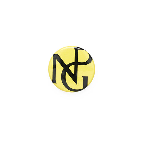 A yellow badge with NPG monogram in black.