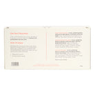 Back of a hot chocolate packaging with text and branding details.