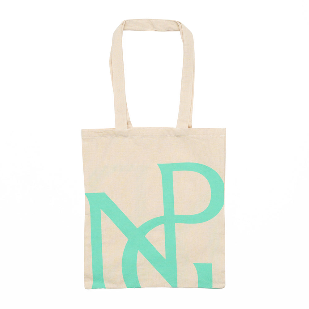 Neutral tone tote bag with the npg monogram in green against a white background