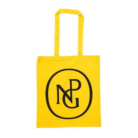 Yellow tote bag with handles, printed with the National Portrait Gallery monogram in black.