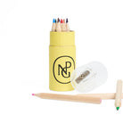 Yellow tube container with coloured pencils and a sharpener on a white background