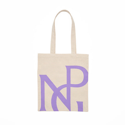 A cream tote bag with handles featuring a large NPG monogram design in purple.