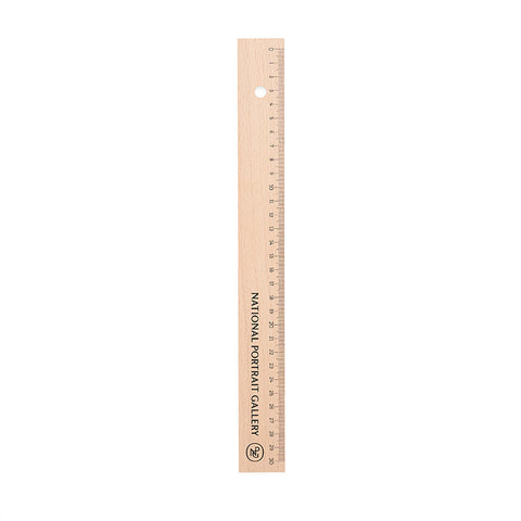 A wooden ruler with the National Portrait Gallery logo and monogram in black.