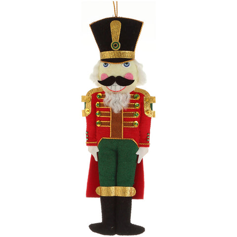 Traditional nutcracker soldier hanging decoration in red with gold detailing. 