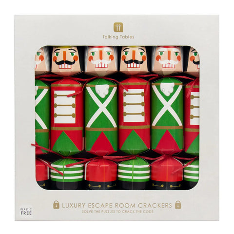 A box of 6 green and red nutcracker decorated Christmas crackers. 