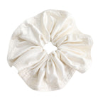 White scrunchie on a white background