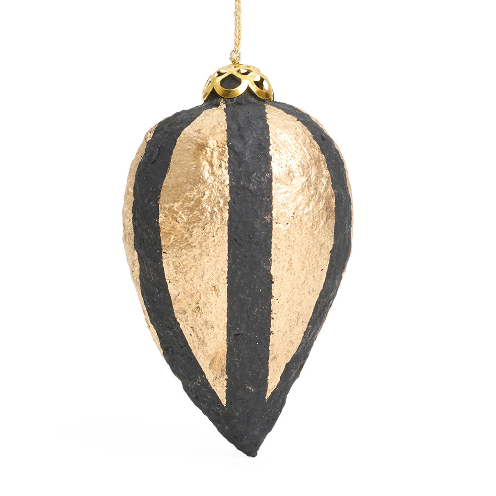 A cone shaped paper mache decoration in black with gold stripes.