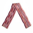 Multicolored striped scarf on a white background