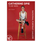 Poster for Catherine Opie: To Be Seen exhibition at the National Portrait Gallery with a person sitting on a stool with a tattooed knee, against a red background.