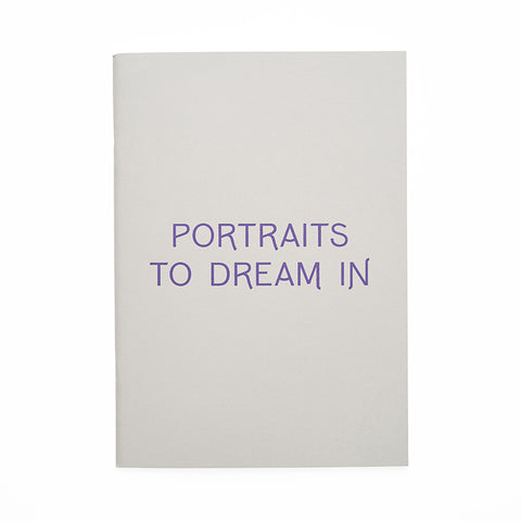 Light grey A4 sketchbook with 'Portraits To Dream In' in purple text.