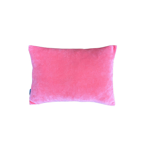 Reverse of rectangular cushion in a pink block colour. 