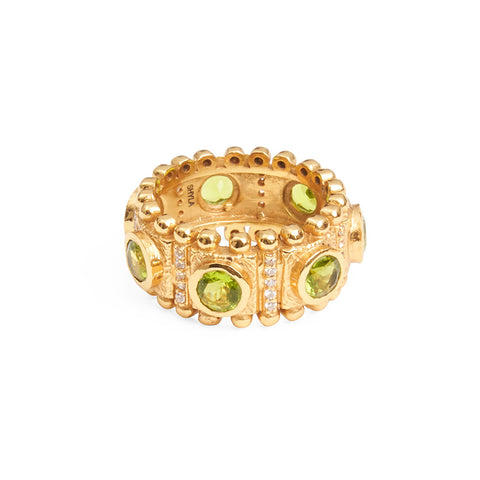 Front view of a textured gold ring with large emerald green crystals and smaller silver crystals embedded in the band.