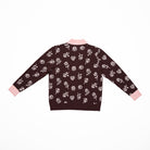 Reverse of brown cardigan with pink floral pattern and collar on a white background
