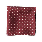 Burgundy coloured pocket square with white polka dots. 