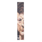 Leather bookmark with abstract painted face design on a white background
