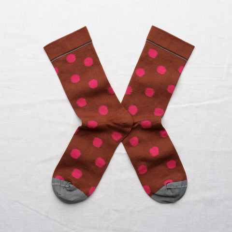 Sepia brown socks with pink polka dots and grey coloured toes.