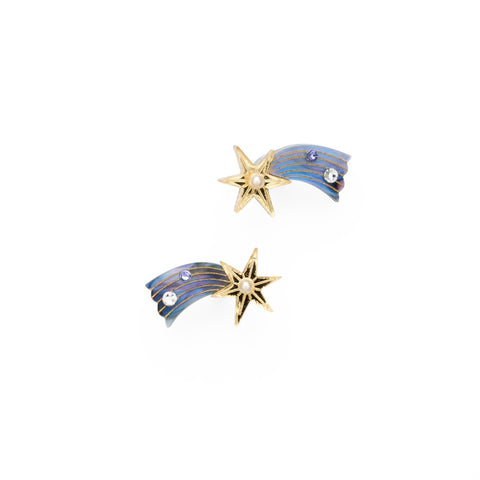 A pair of gold shooting star earrings with blue marbled tails and pearl details.